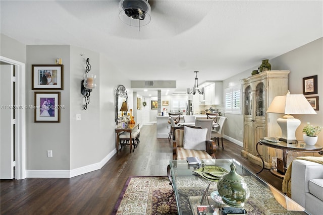 1651 SW 127th Ave Unit 301A, Pembroke Pines, FL 33027 - living room featuring dark wood-type flooring, a chandelier, and ceiling fan