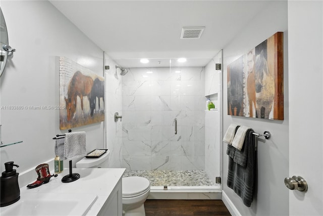 1651 SW 127th Ave Unit 301A, Pembroke Pines, FL 33027 - full bathroom featuring a marble finish shower, vanity, wood finished floors, and recessed lighting