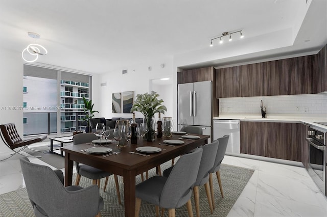 488 NE 18th St Unit 1503, Miami, FL 33132 - dining area featuring light marble finish flooring