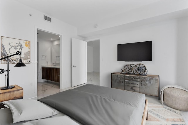 488 NE 18th St Unit 1503, Miami, FL 33132 - bedroom with light marble finish floors and connected bathroom