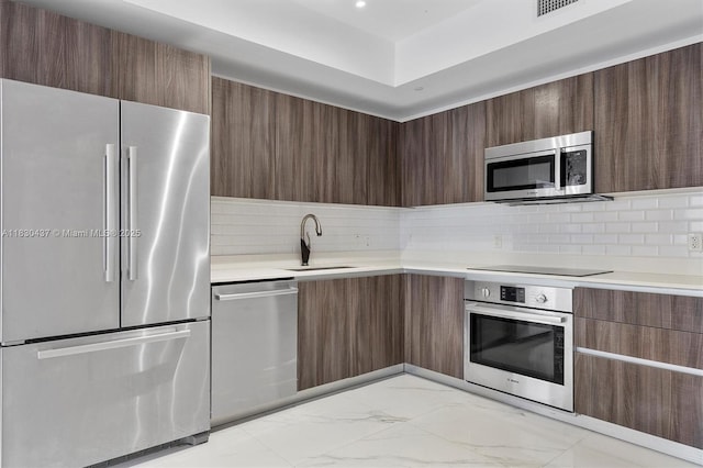 488 NE 18th St Unit 1503, Miami, FL 33132 - kitchen with appliances with stainless steel finishes and modern cabinets