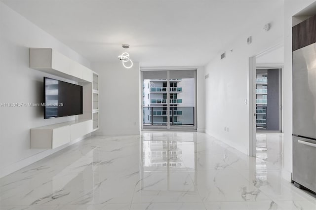 488 NE 18th St Unit 1503, Miami, FL 33132 - unfurnished living room featuring light marble finish flooring