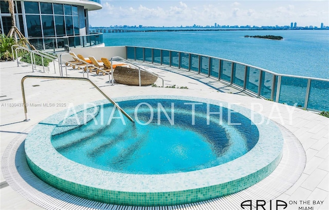 488 NE 18th St Unit 1503, Miami, FL 33132 - view of pool featuring a water view, a skyline view, and a patio