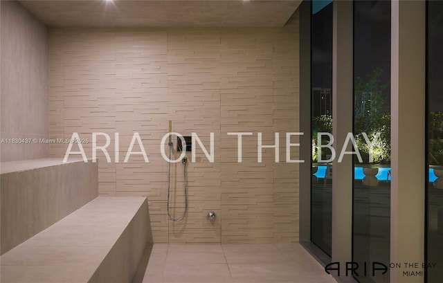 488 NE 18th St Unit 1503, Miami, FL 33132 - full bath with a tile shower and tile patterned floors