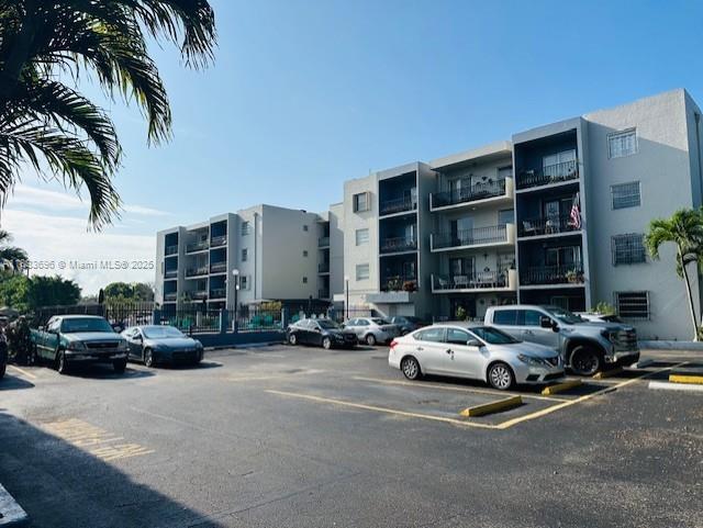 3181 SW 13th St Unit 307, Miami, FL 33145 - view of apartment building / complex with uncovered parking