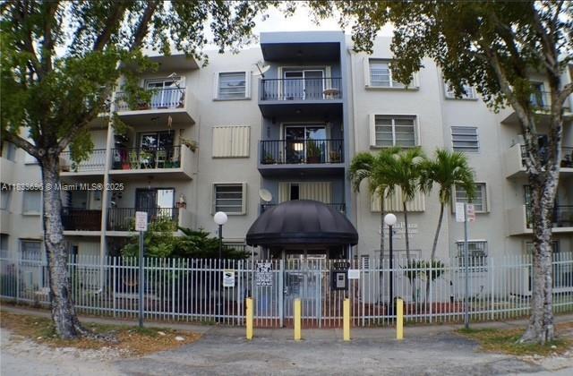 3181 SW 13th St Unit 307, Miami, FL 33145 - view of apartment building / complex