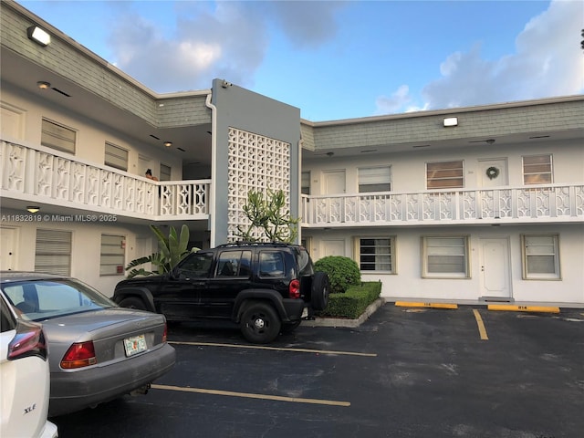 1860 Venice Park Dr Unit 110, North Miami, FL 33181 - view of property featuring uncovered parking