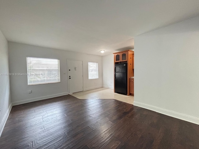 1860 Venice Park Dr Unit 110, North Miami, FL 33181 - foyer with baseboards and light wood-style flooring