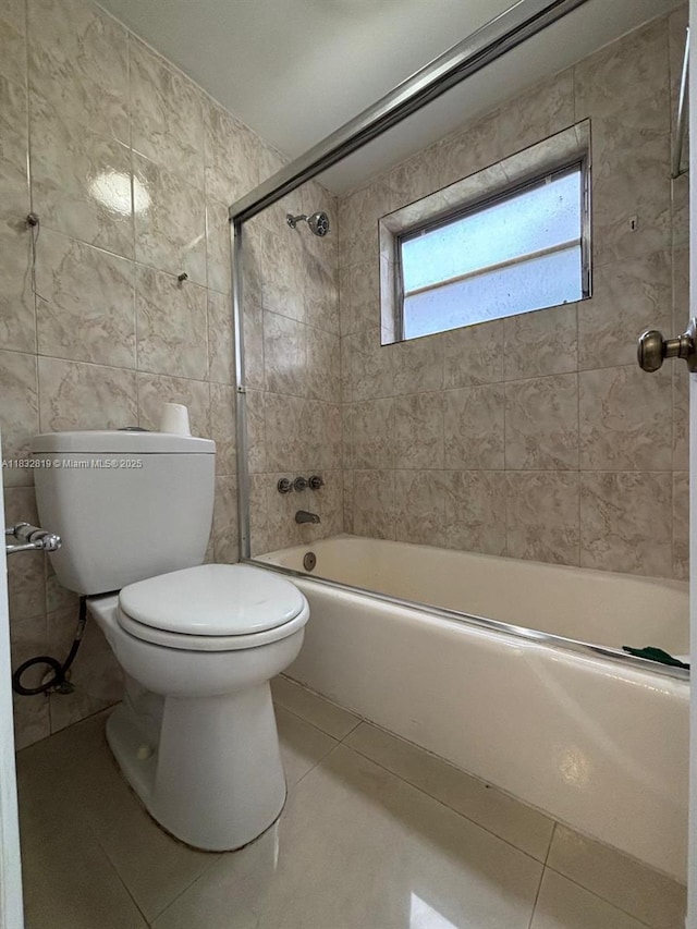 1860 Venice Park Dr Unit 110, North Miami, FL 33181 - full bath with tile patterned flooring, bathing tub / shower combination, and tile walls