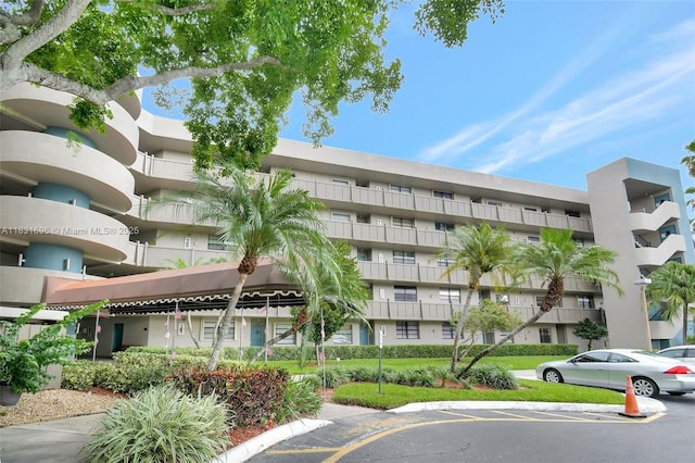 1001 Colony Point Cir Unit 220, Pembroke Pines, FL 33026 - view of apartment building / complex featuring uncovered parking
