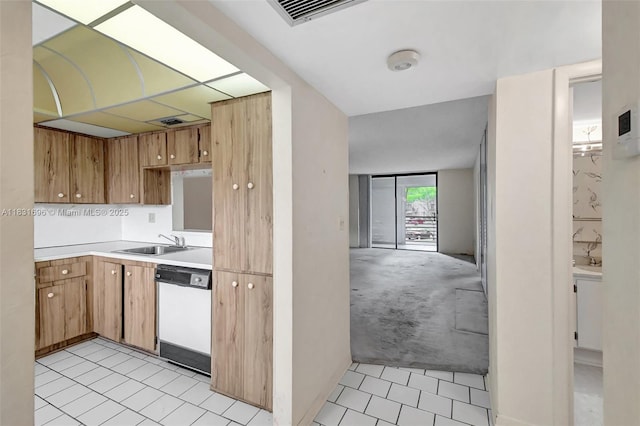 1001 Colony Point Cir Unit 220, Pembroke Pines, FL 33026 - kitchen featuring white dishwasher, light tile patterned floors, and light countertops
