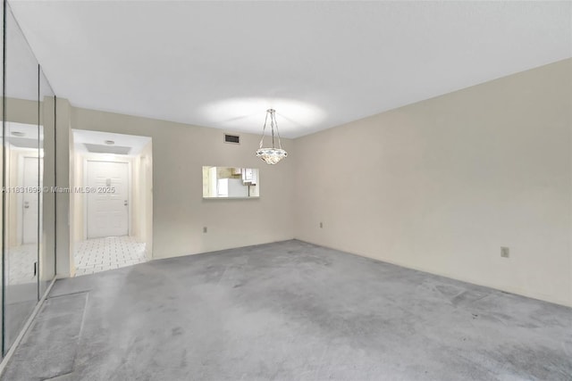 1001 Colony Point Cir Unit 220, Pembroke Pines, FL 33026 - empty room with carpet floors and a chandelier