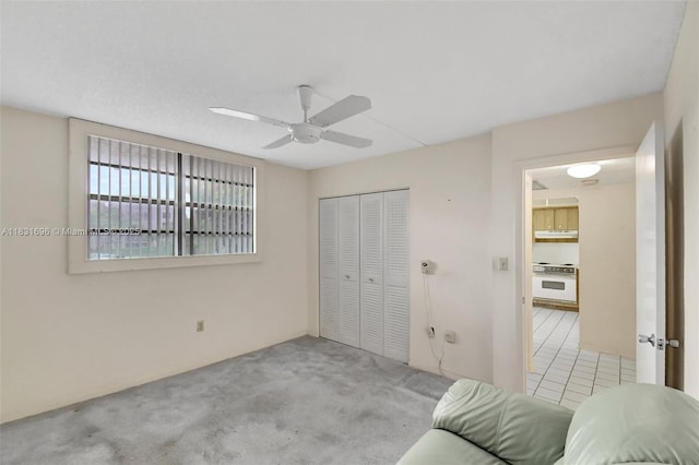 1001 Colony Point Cir Unit 220, Pembroke Pines, FL 33026 - bedroom with carpet flooring, a closet, and a ceiling fan