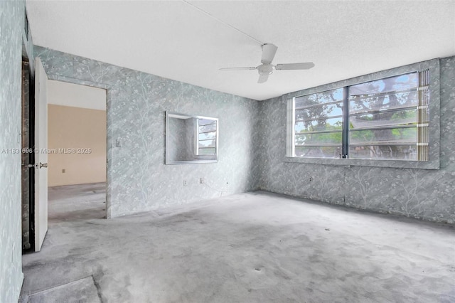 1001 Colony Point Cir Unit 220, Pembroke Pines, FL 33026 - empty room with ceiling fan, wallpapered walls, and a textured ceiling
