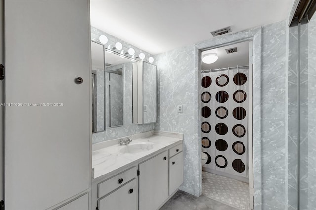1001 Colony Point Cir Unit 220, Pembroke Pines, FL 33026 - bathroom featuring vanity, wallpapered walls, and curtained shower