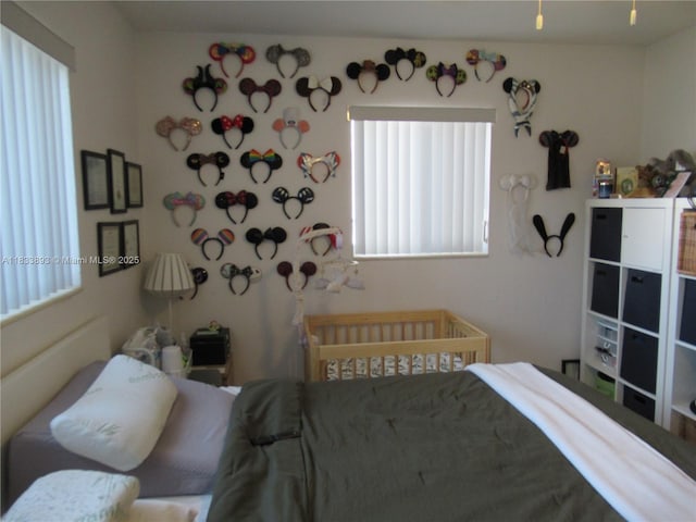 6910 SW 26th Ct, Miramar, FL 33023 - bedroom featuring a nursery area