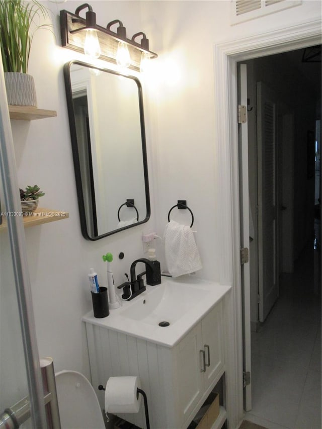 6910 SW 26th Ct, Miramar, FL 33023 - half bathroom with vanity and toilet