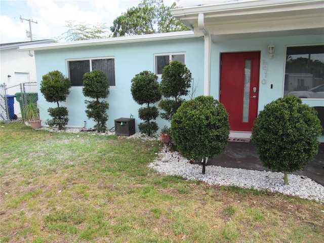 6910 SW 26th Ct, Miramar, FL 33023 - doorway to property with stucco siding