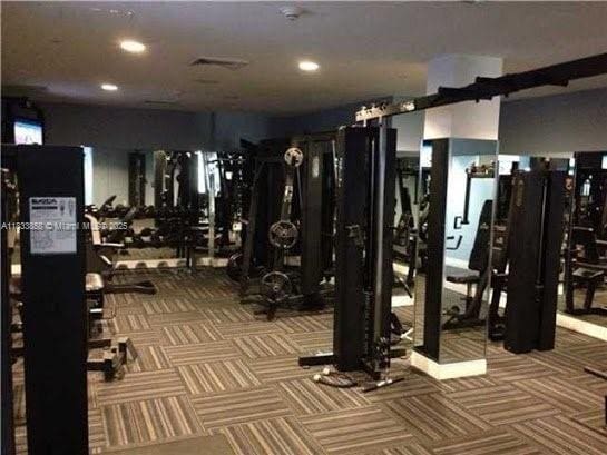 1250 S Miami Ave Unit 1209, Miami, FL 33130 - workout area featuring carpet and recessed lighting