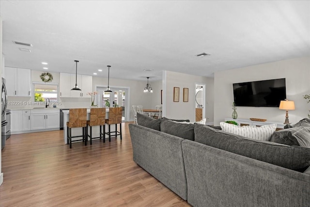 9360 SW 185th St, Cutler Bay, FL 33157 - living area with light wood-style floors and recessed lighting