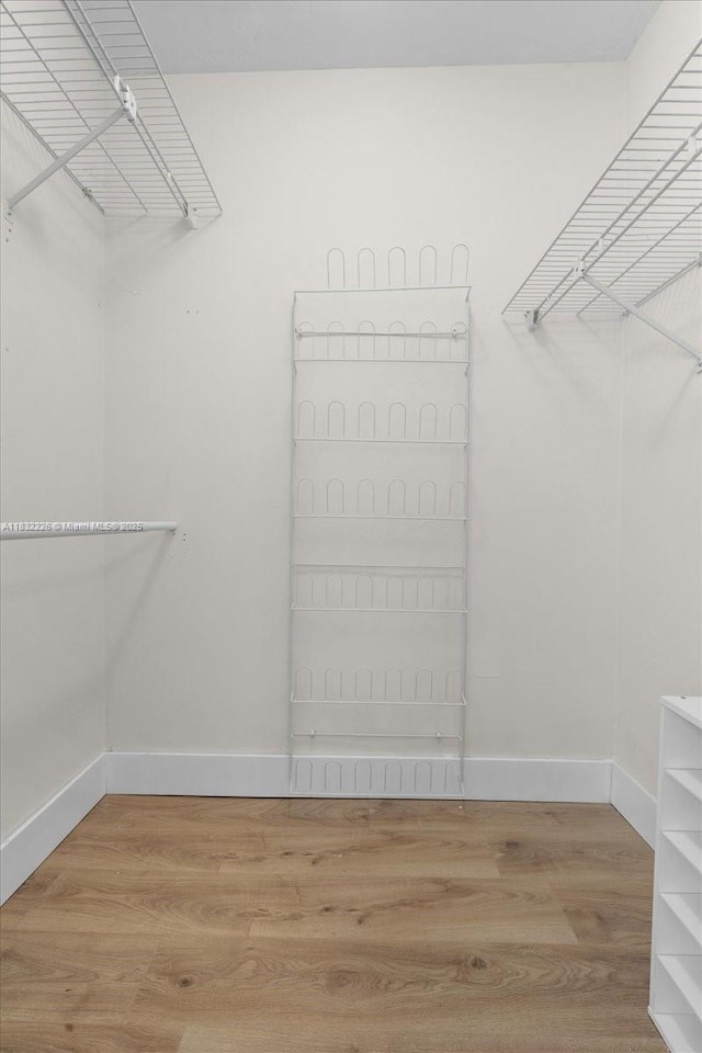 9360 SW 185th St, Cutler Bay, FL 33157 - walk in closet with wood finished floors