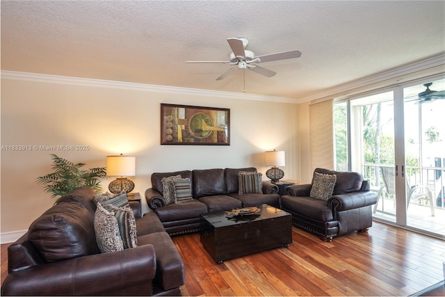 101 Gulfview Dr Unit 202, Key Colony, FL 33036 - living room with a ceiling fan, hardwood / wood-style flooring, crown molding, and a textured ceiling