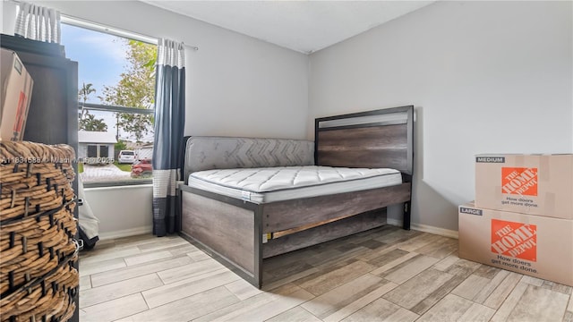 1226 SW Curry St, Port St Lucie, FL 34983 - bedroom featuring wood tiled floors