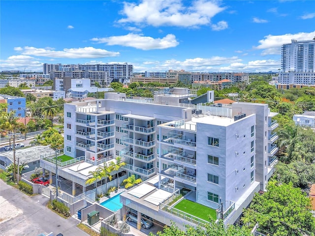 1850 Monroe Unit 303, Hollywood, FL 33020 - view of urban area featuring apartment complex and a pool
