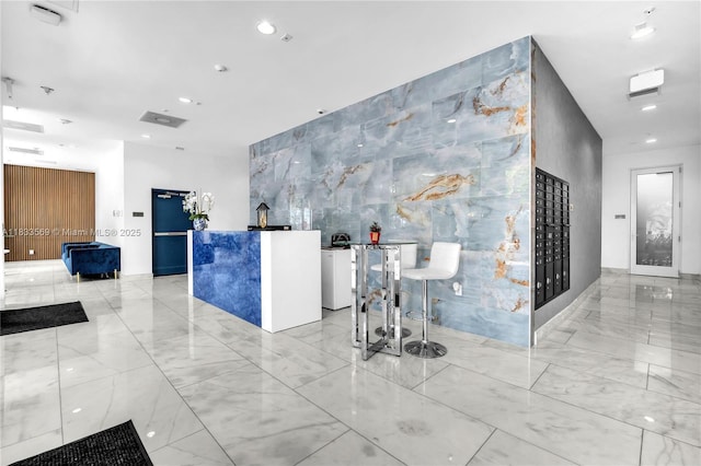 1850 Monroe Unit 303, Hollywood, FL 33020 - reception area featuring tile walls and recessed lighting