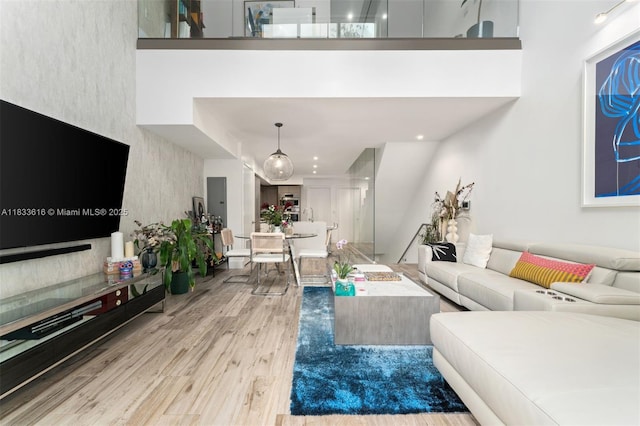 455 NE 39th St Unit 105, Miami, FL 33137 - living room with wood finished floors and a high ceiling