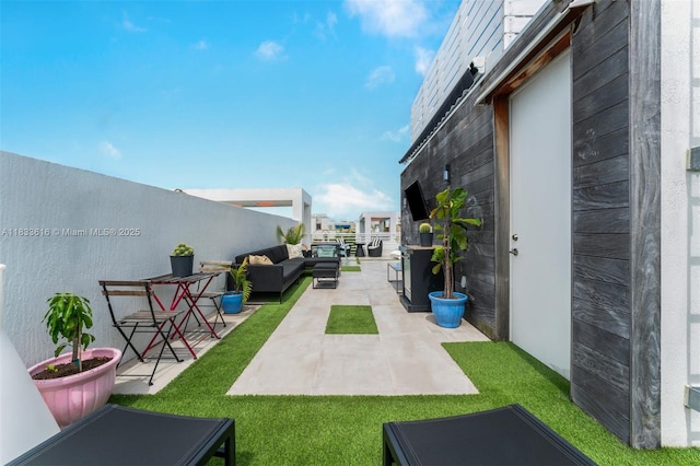 455 NE 39th St Unit 105, Miami, FL 33137 - view of grassy yard featuring an outdoor hangout area and a patio area