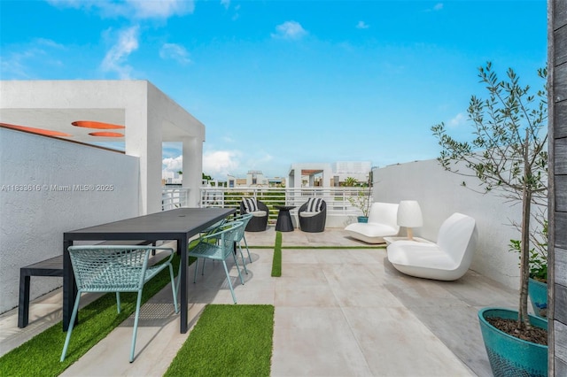 455 NE 39th St Unit 105, Miami, FL 33137 - view of patio with outdoor dining area