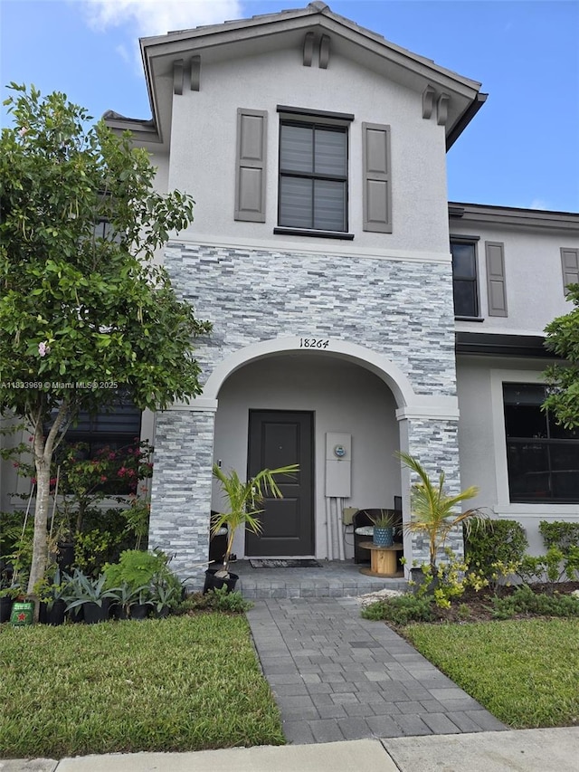 18264 SW 148th Rd Unit 18264, Miami, FL 33187 - view of front of home with stucco siding and stone siding