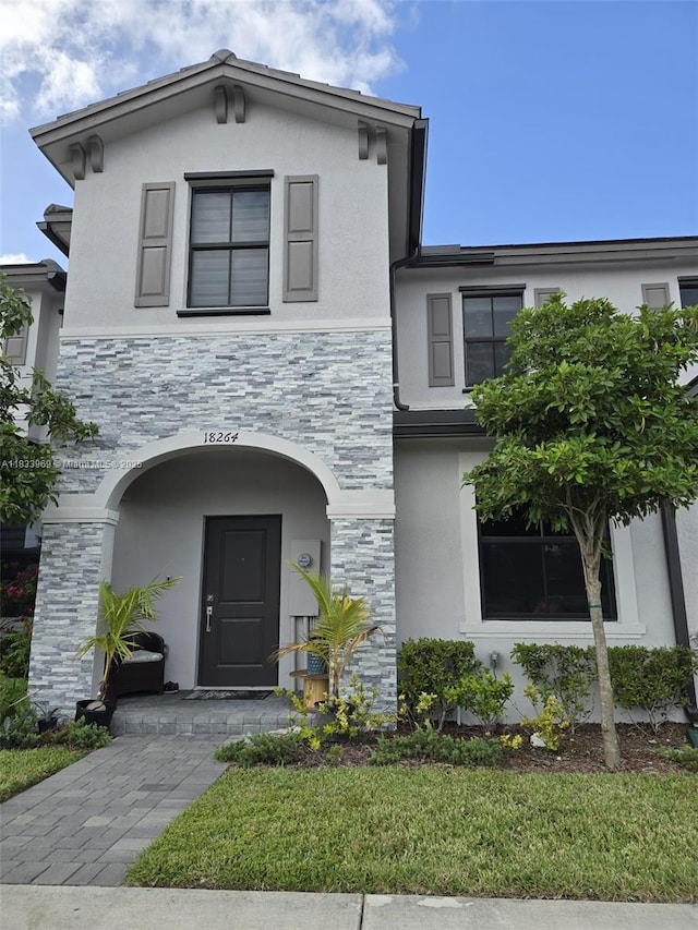 18264 SW 148th Rd Unit 18264, Miami, FL 33187 - view of front facade featuring stucco siding and stone siding
