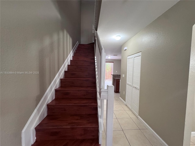 9239 SW 227th St, Cutler Bay, FL 33190 - stairs featuring tile patterned floors and a textured wall