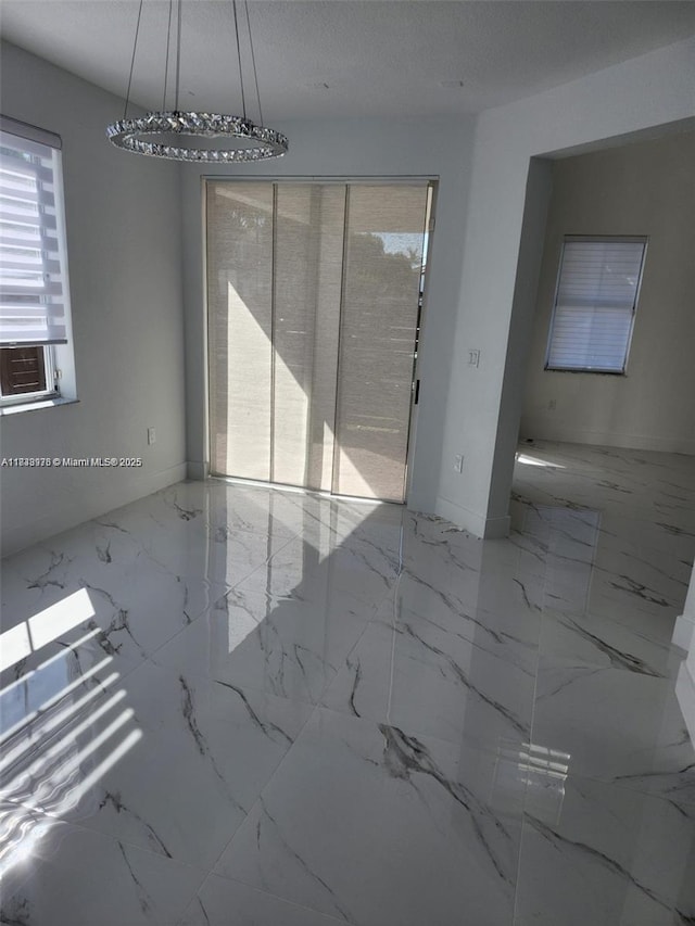 8465 NW 108th Path, Doral, FL 33178 - unfurnished room featuring marble tiled flooring and cooling unit
