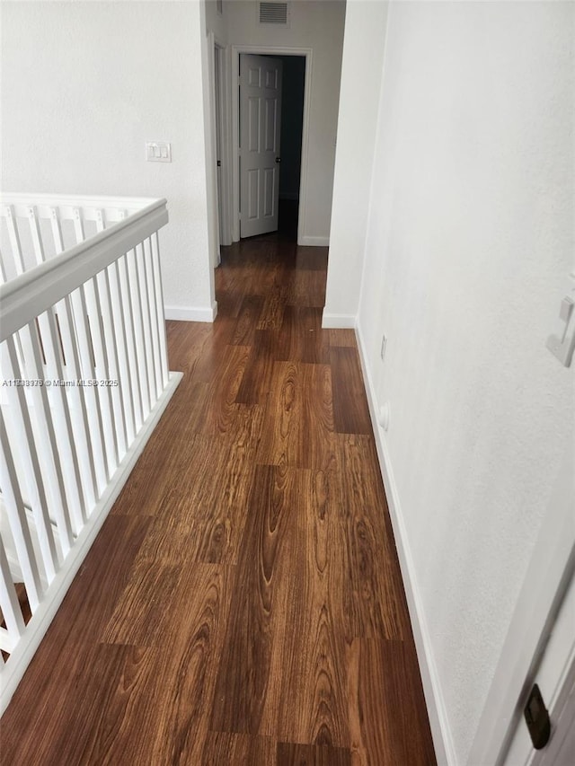 8465 NW 108th Path, Doral, FL 33178 - corridor featuring dark wood-style floors and an upstairs landing