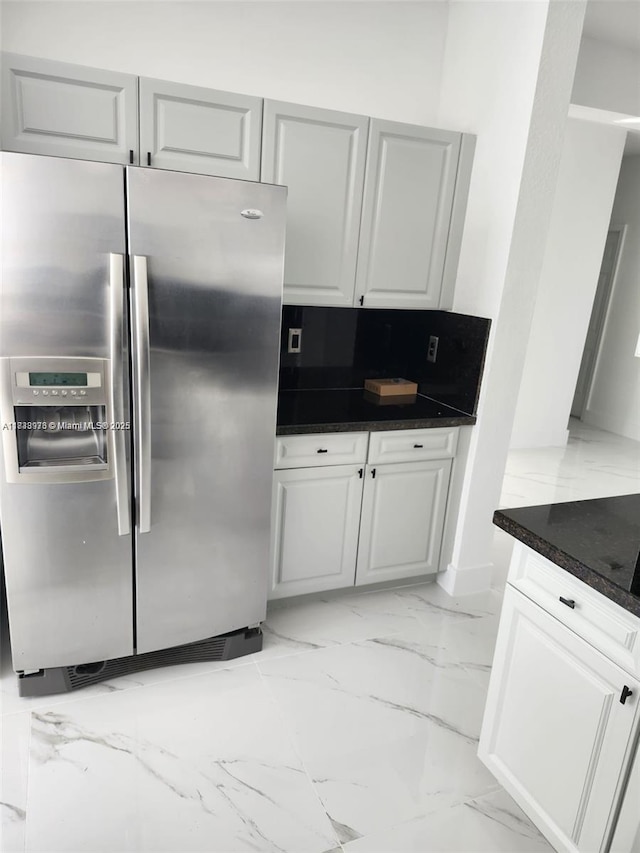 8465 NW 108th Path, Doral, FL 33178 - kitchen featuring stainless steel refrigerator with ice dispenser, light marble finish floors, and tasteful backsplash