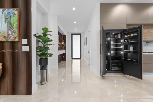436 NE 10th Ave, Fort Lauderdale, FL 33301 - hallway featuring baseboards and recessed lighting