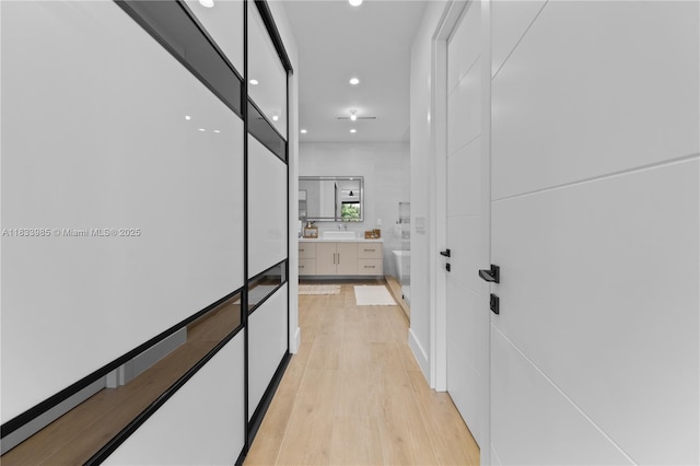 436 NE 10th Ave, Fort Lauderdale, FL 33301 - hall featuring recessed lighting and light wood-style flooring