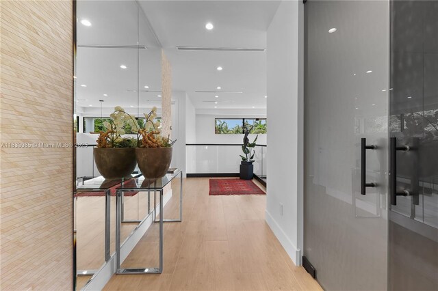 436 NE 10th Ave, Fort Lauderdale, FL 33301 - corridor featuring wood finished floors and recessed lighting