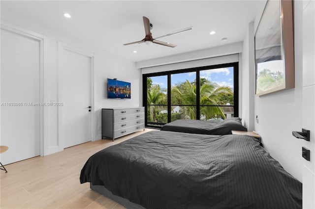436 NE 10th Ave, Fort Lauderdale, FL 33301 - bedroom featuring light wood-style flooring, access to outside, recessed lighting, and a ceiling fan