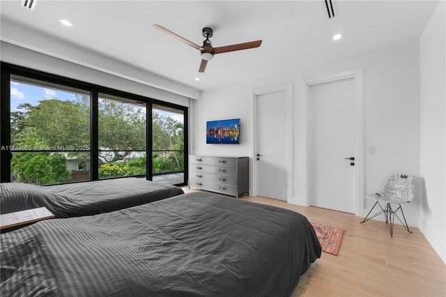 436 NE 10th Ave, Fort Lauderdale, FL 33301 - bedroom featuring light wood-style floors, recessed lighting, and ceiling fan
