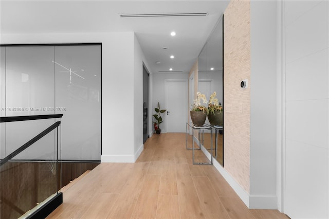 436 NE 10th Ave, Fort Lauderdale, FL 33301 - hallway featuring light wood-style flooring and recessed lighting