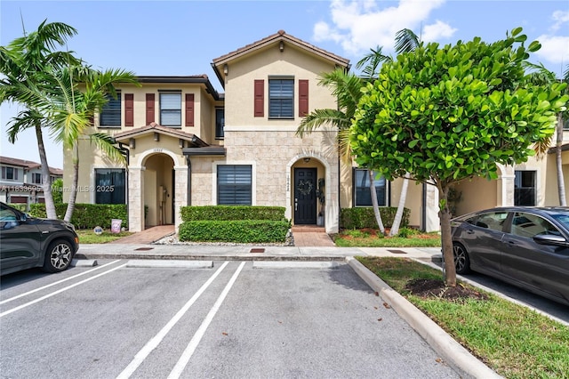 10468 W 33rd Ln, Hialeah, FL 33018 - multi unit property with stucco siding, uncovered parking, and stone siding