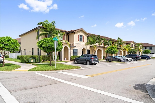 10468 W 33rd Ln, Hialeah, FL 33018 - view of building exterior with uncovered parking