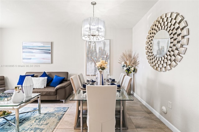 10468 W 33rd Ln, Hialeah, FL 33018 - dining area featuring a chandelier and tile patterned flooring
