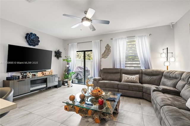 10468 W 33rd Ln, Hialeah, FL 33018 - living room with a ceiling fan and light tile patterned floors