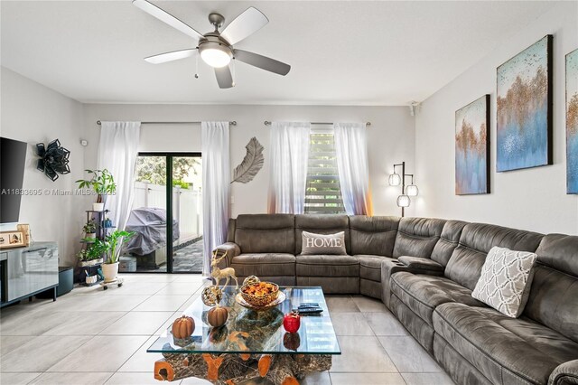 10468 W 33rd Ln, Hialeah, FL 33018 - living room featuring light tile patterned floors, plenty of natural light, and ceiling fan