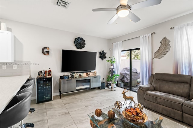 10468 W 33rd Ln, Hialeah, FL 33018 - living room with light tile patterned floors, a ceiling fan, and wine cooler